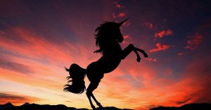 Picture of unicorn against colourful sky